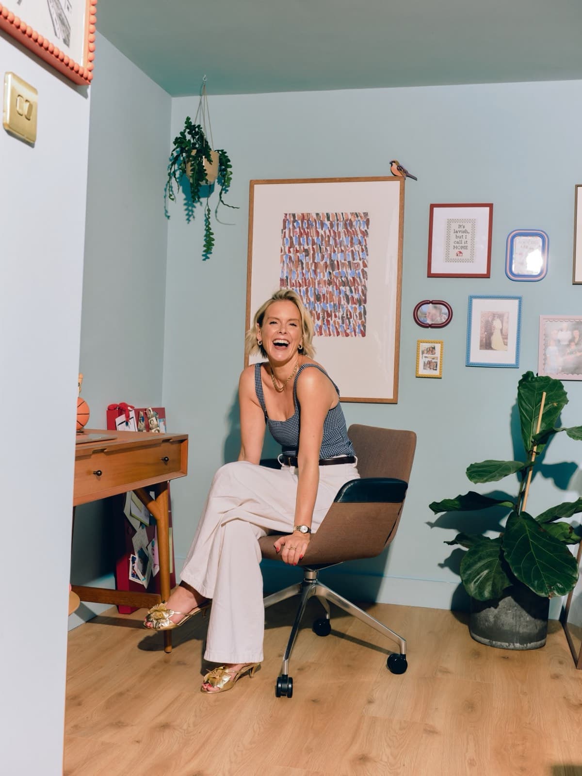 Lauren Spearman laughing in her studio